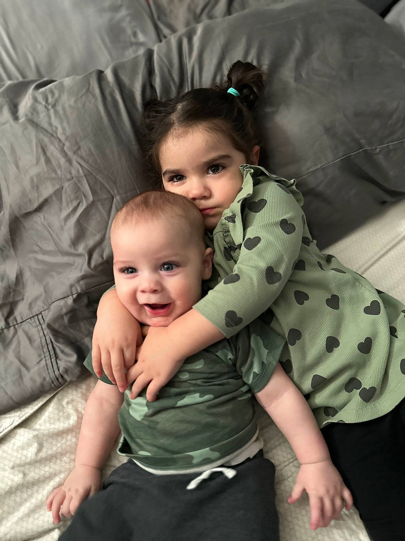 Solana is registered to the contest to win money with this photo: baby, baby_toddler_clothing, child, comfort, flash_photography, fun, gesture, grass, happy, iris, monochrome, monochrome_photography, person, sitting, skin, sleeve, smile, standing, style, toddler