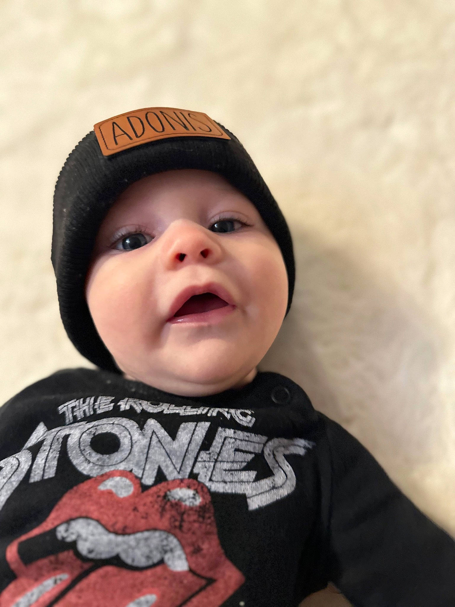 Adonis joined the competition — help win amazing prizes! baby, baby_toddler_clothing, beard, cap, carmine, cheek, eye, eyelash, flash_photography, happy, headgear, headwear, jaw, lip, mouth, nose, person, personal_protective_equipment, sleeve, smile