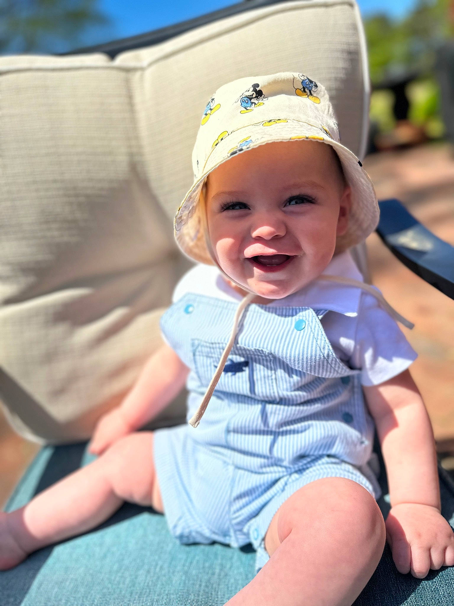 Adonis is registered to the contest to win money with this photo: baby, baby_toddler_clothing, baseball_cap, blond, cap, child, comfort, electric_blue, fashion_accessory, fun, grass, happy, hat, headwear, joy, leisure, person, recreation, sitting, skin