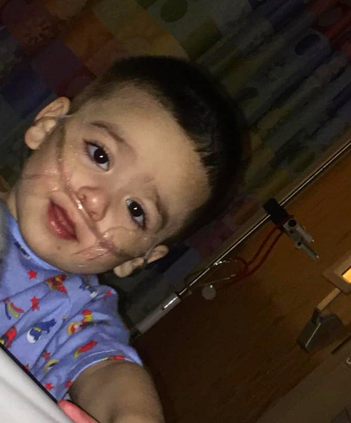 Adan is registered to the contest to win money with this photo: black_hair, cheek, child, chin, ear, eye, eyebrow, face, forehead, fun, head, lip, mouth, nose, person, photography, selfie, skin, smile, toddler