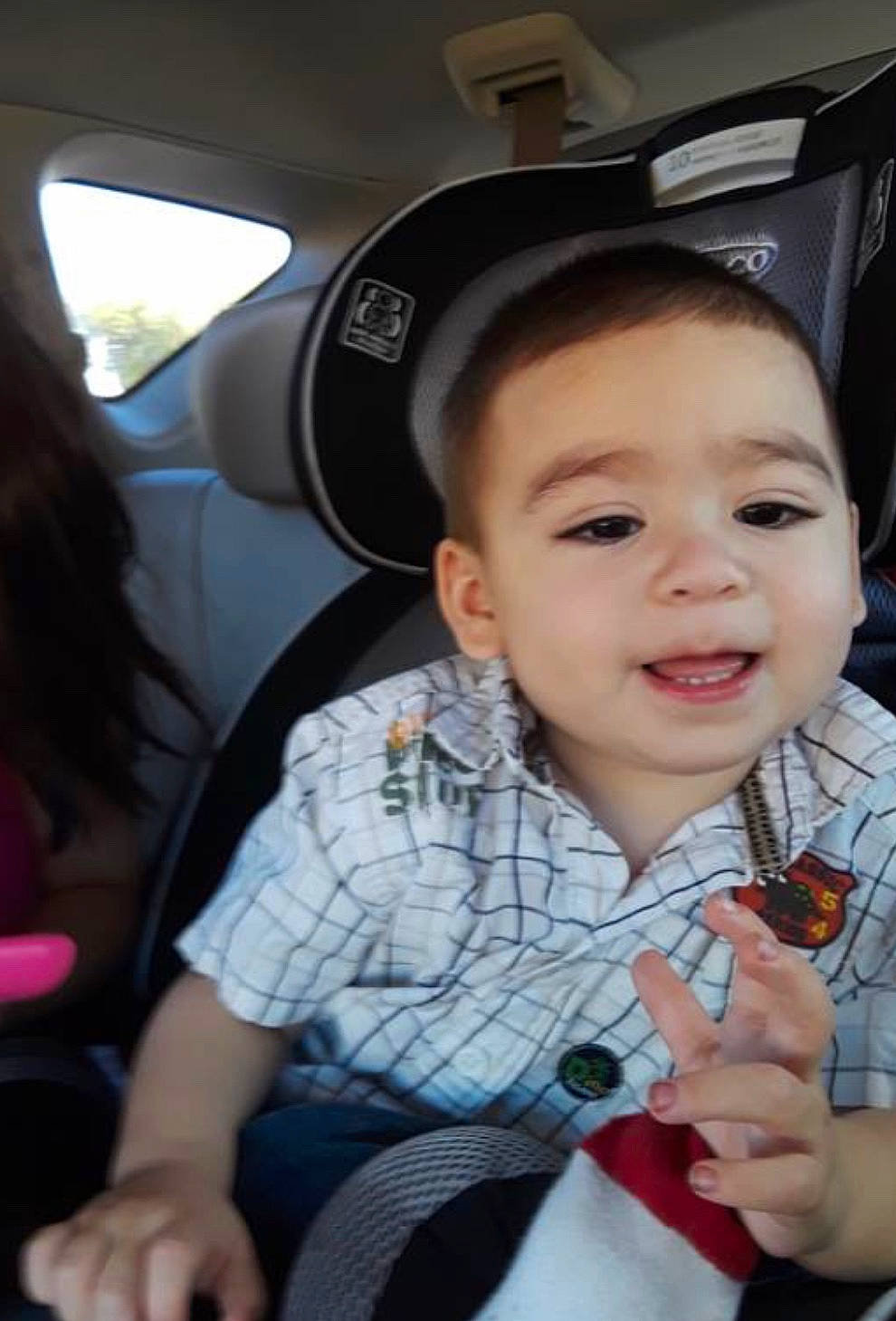 Adan is registered to the contest to win money with this photo: baby, car_seat, child, cool, finger, person, smile, toddler