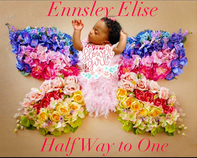 Ennsley Elise Barber is registered to the contest to win money with this photo: baby_toddler_clothing, bouquet, cake_decorating_supply, child, cut_flowers, event, floral_design, floristry, flower, flower_arranging, font, happy, lei, magenta, peach, person, petal, pink, sugar_cake, sweetness
