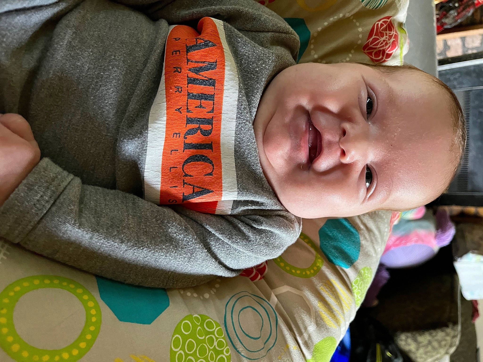 Ashton joined the competition — help win amazing prizes! baby, baby_products, baby_toddler_clothing, cheek, child, comfort, elbow, finger, hand, happy, headgear, human_body, mouth, nose, pattern, person, skin, sleeve, smile, toddler