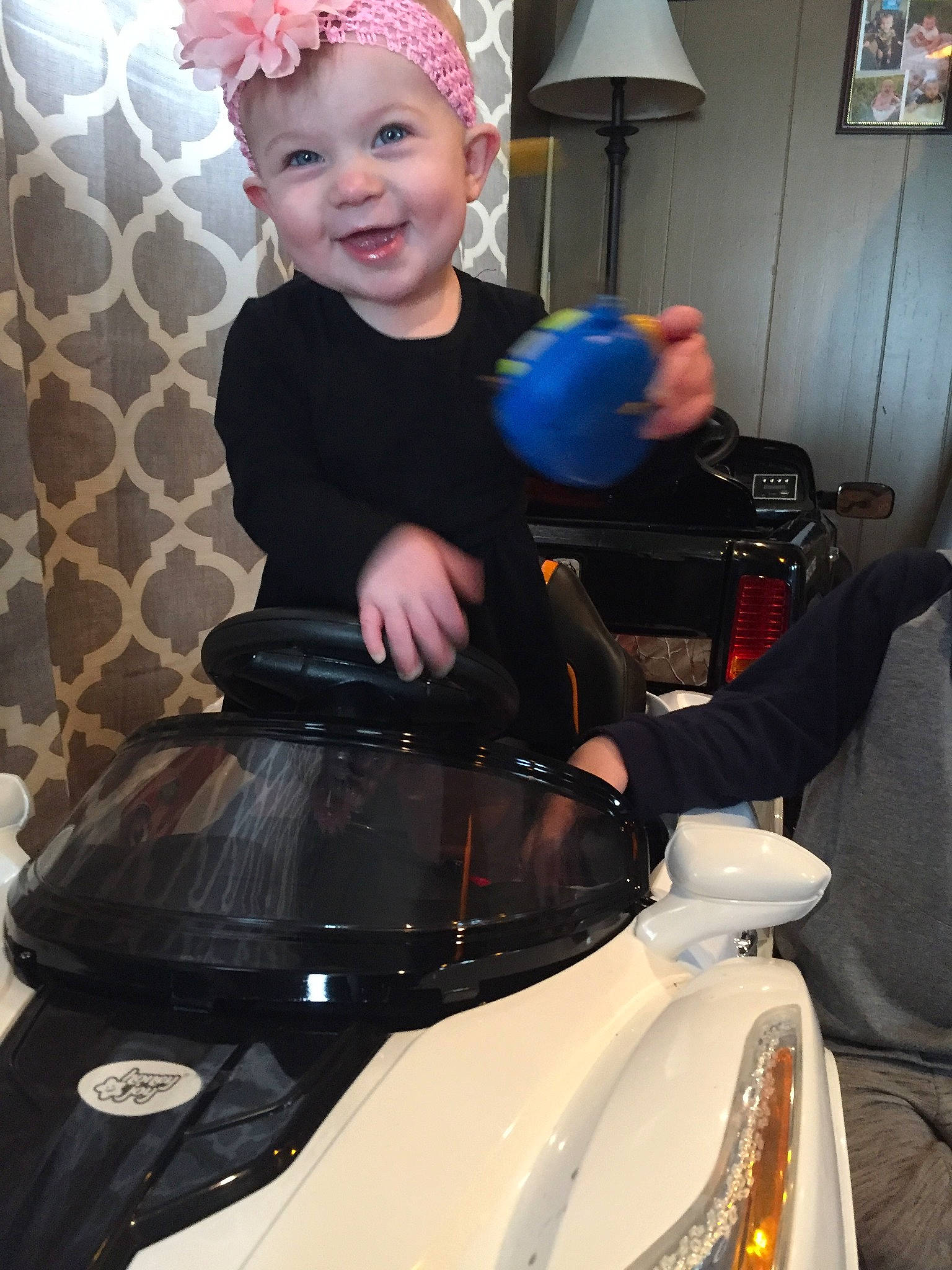 Mela joined the competition — help win amazing prizes! auto_part, automotive_design, automotive_lighting, automotive_window_part, blond, car, child, glass, headlamp, headwear, helmet, joy, person, smile, toddler, vehicle, window, windshield