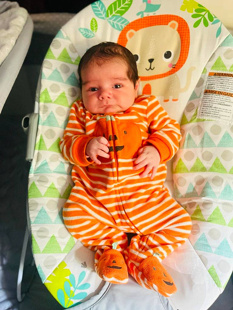 Matteo joined the competition — help win amazing prizes! baby, baby_products, baby_toddler_clothing, carmine, child, comfort, happy, linens, orange, pattern, peach, person, plaid, room, sleeve, textile, toddler