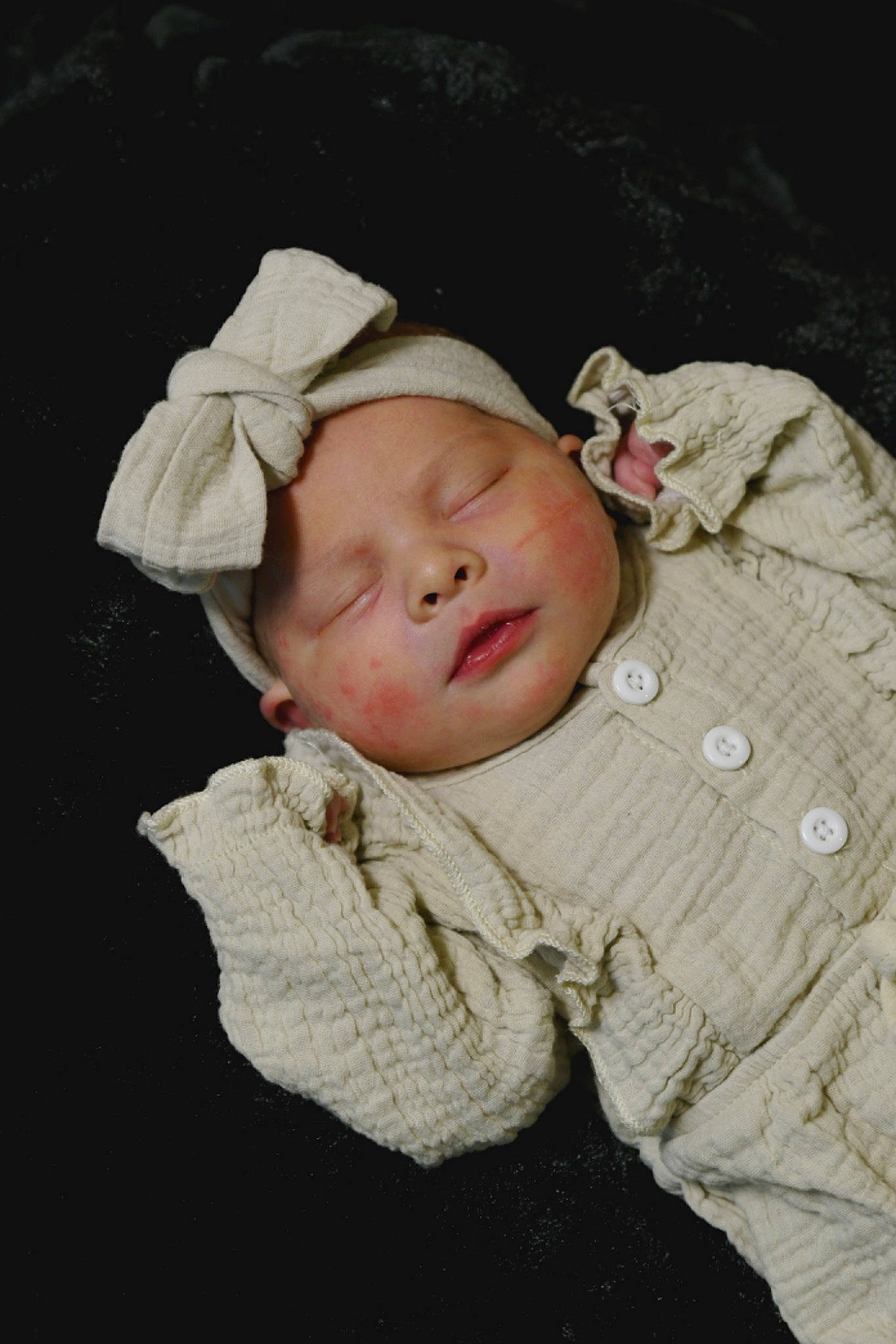 Kaeli is registered to the contest to win money with this photo: baby, baby_toddler_clothing, cap, cheek, child, chin, collar, comfort, eye, flash_photography, fur, grass, headgear, headwear, lip, nose, person, portrait_photography, skin, sleeve