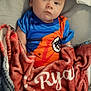 baby, blanket, child, colorful_clothing, comfort, cozy, cushion, cute, fabric, face, indoor, infant, laying, mountain, portrait, resting, soft_toy, toddler, toy, wilderness