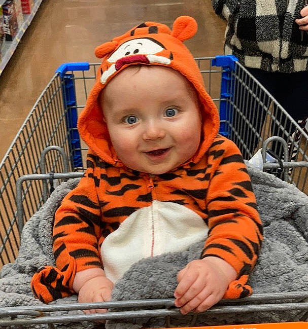 Jameson joined the competition — help win amazing prizes! baby, baby_carriage, baby_products, baby_safety, baby_toddler_clothing, cap, cheek, child, fun, happy, headwear, hoodie, joy, leisure, orange, person, personal_protective_equipment, recreation, sitting, sleeve
