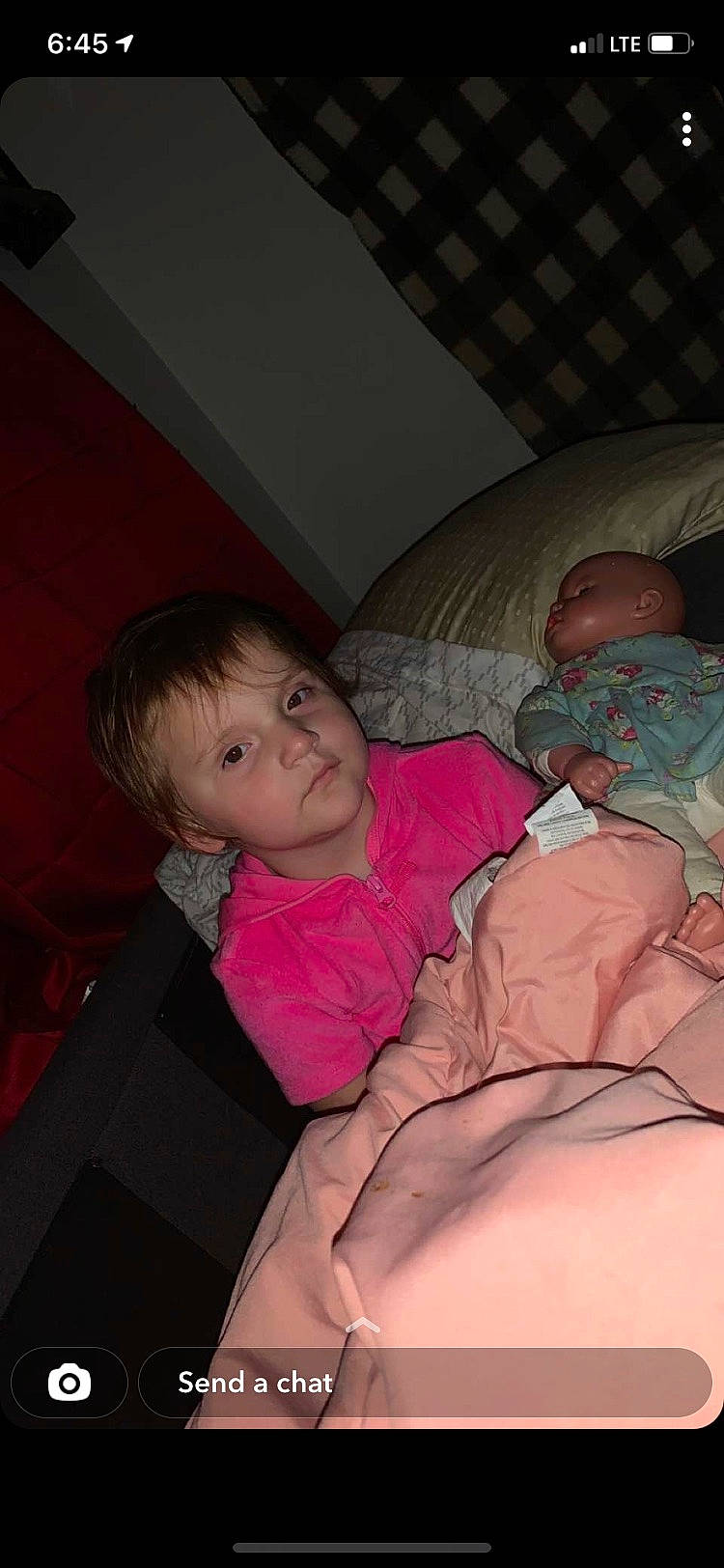 Indigo is registered to the contest to win money with this photo: abdomen, baby, cheek, child, comfort, couch, finger, human_body, lap, linens, mouth, nose, person, pink, skin, stomach, textile, thigh, toddler, trunk