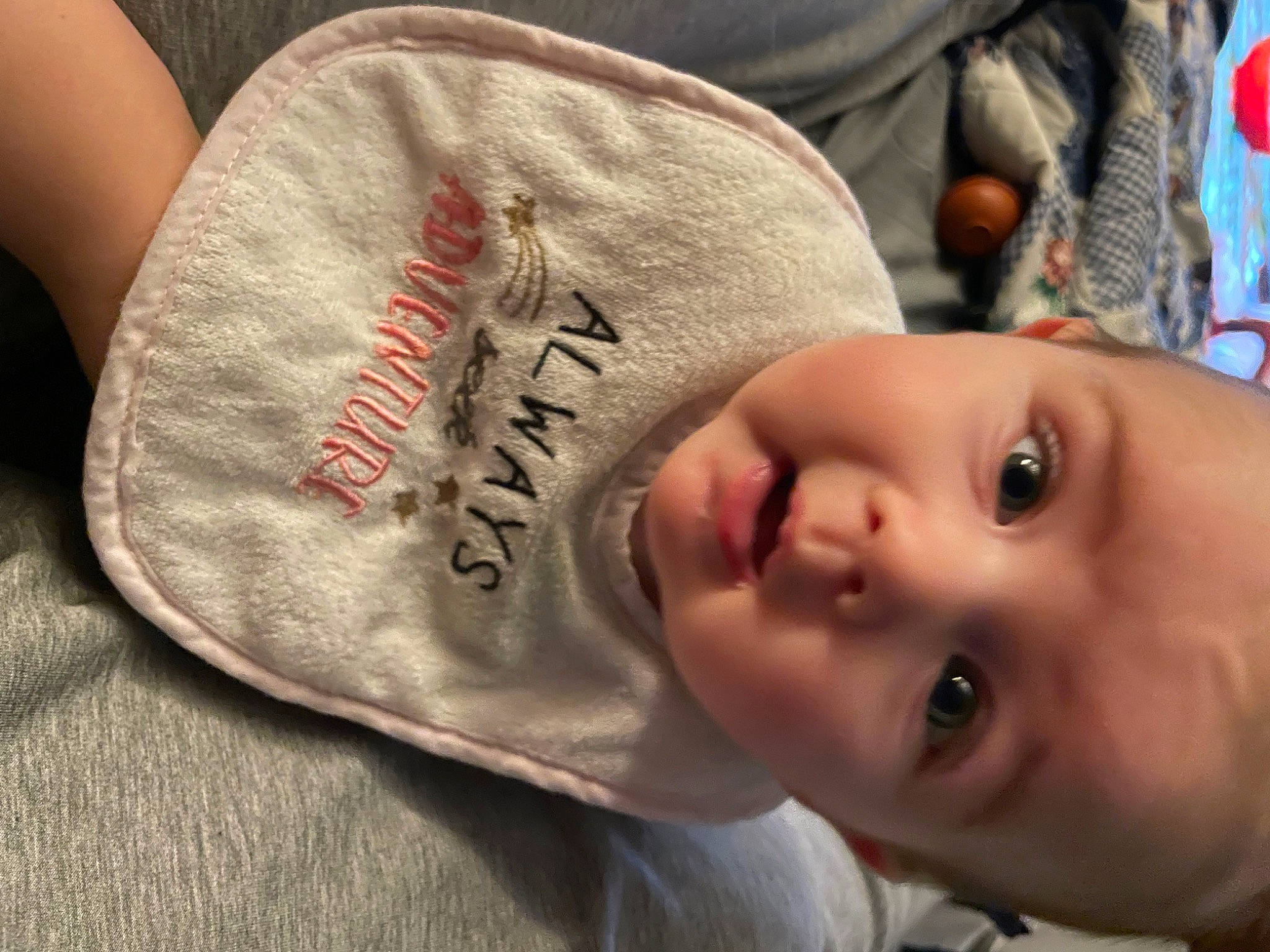 Scottlynn is registered to the contest to win money with this photo: baby, baby_toddler_clothing, balloon, cap, cheek, child, close_up, comfort, eyelash, forehead, grass, headgear, lip, mouth, nose, person, plant, skin, sleeve, smile