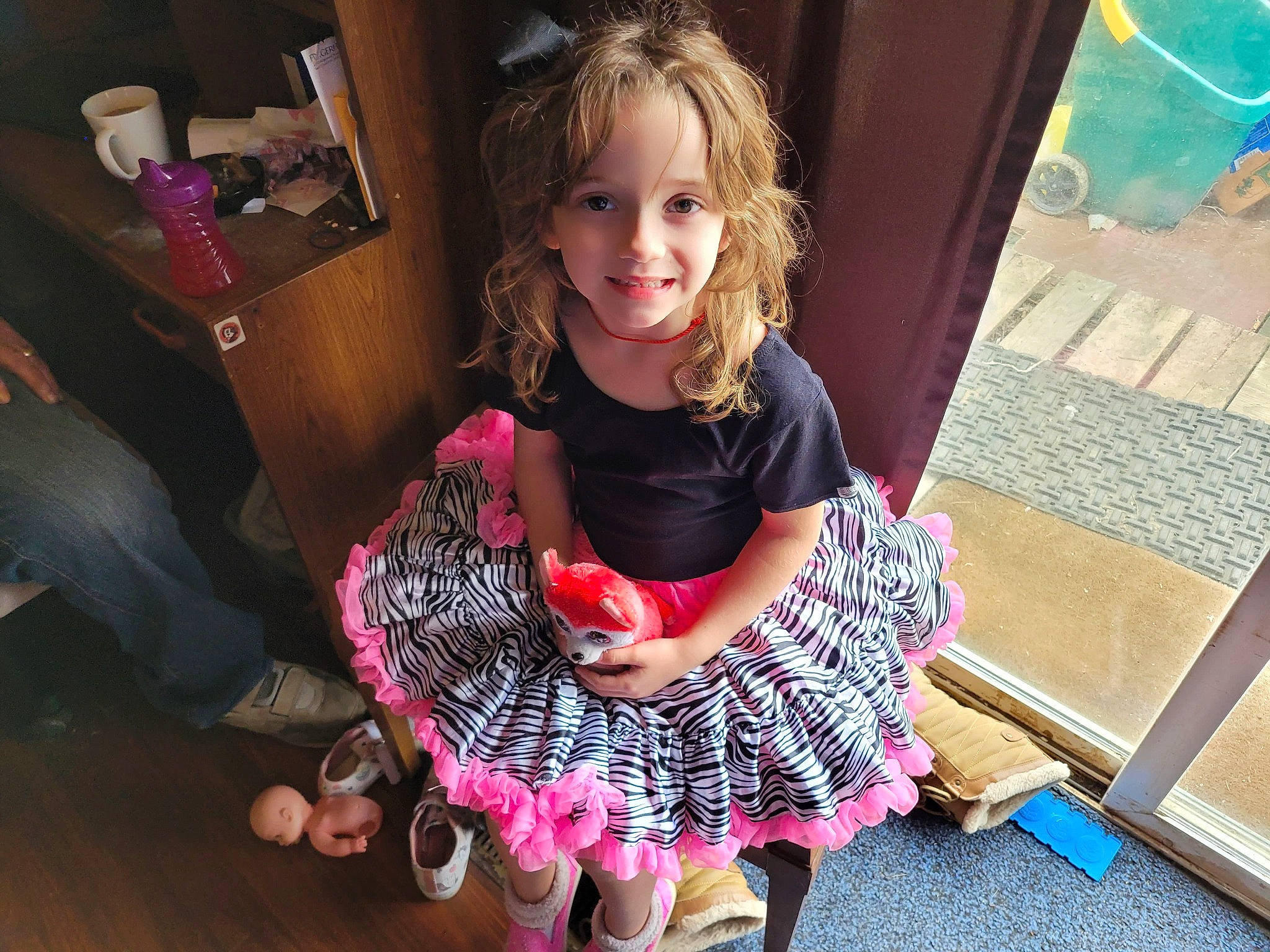 Miracle is registered to the contest to win money with this photo: baby_toddler_clothing, black, child, cool, embellishment, fashion, flooring, fun, green, happy, joy, magenta, pattern, person, pink, purple, sitting, sleeve, smile, textile