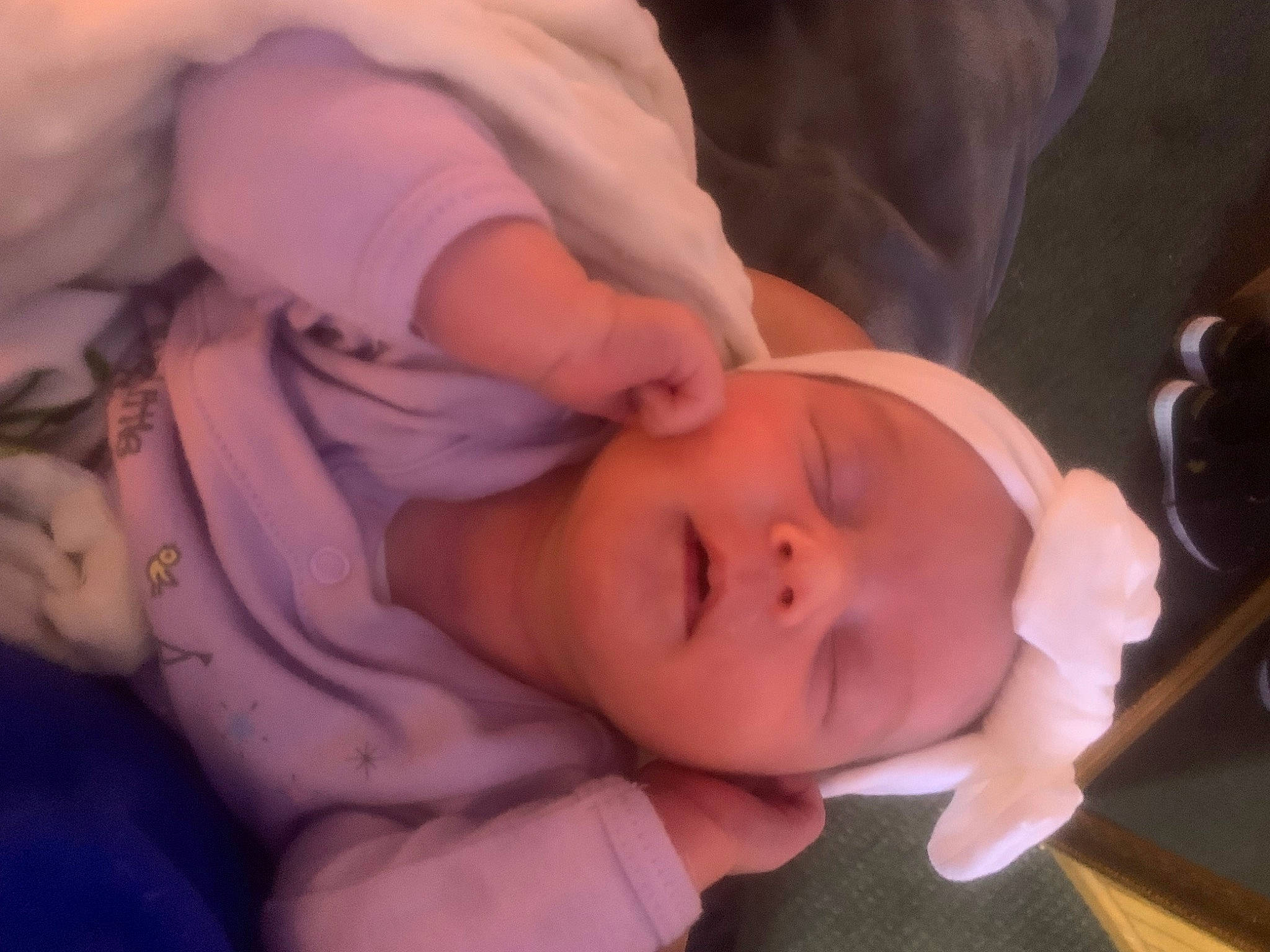 Kayla is registered to the contest to win money with this photo: arm, baby, baby_toddler_clothing, cheek, chin, comfort, ear, eye, eyebrow, eyelash, finger, gesture, head, human_body, iris, lip, mouth, nose, person, skin