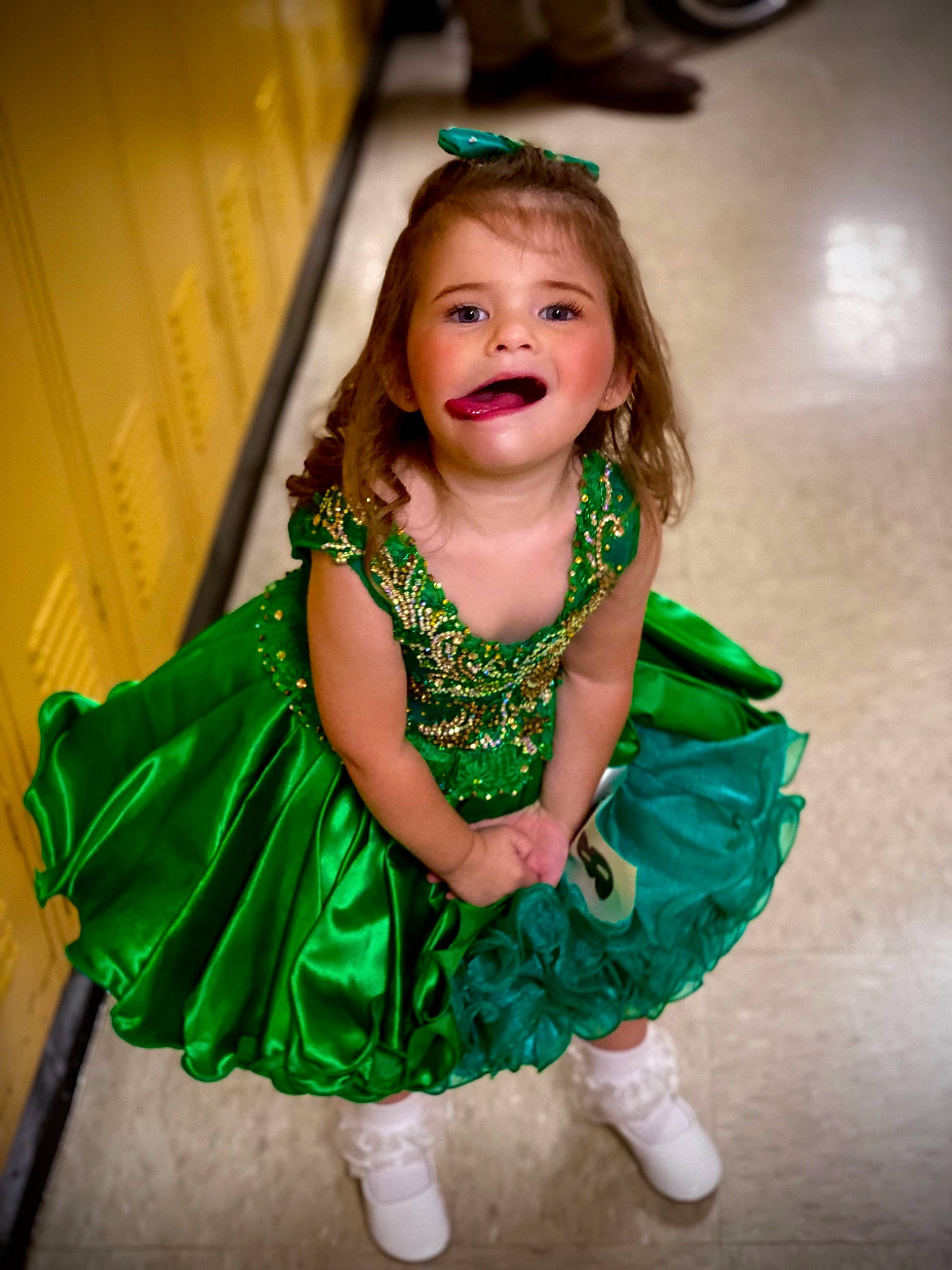 Wrenley is registered to the contest to win money with this photo: baby_toddler_clothing, child, day_dress, dress, entertainment, event, fashion_accessory, fashion_design, flash_photography, formal_wear, fun, grass, hair, happy, headpiece, jewellery, performing_arts, person, skin, smile