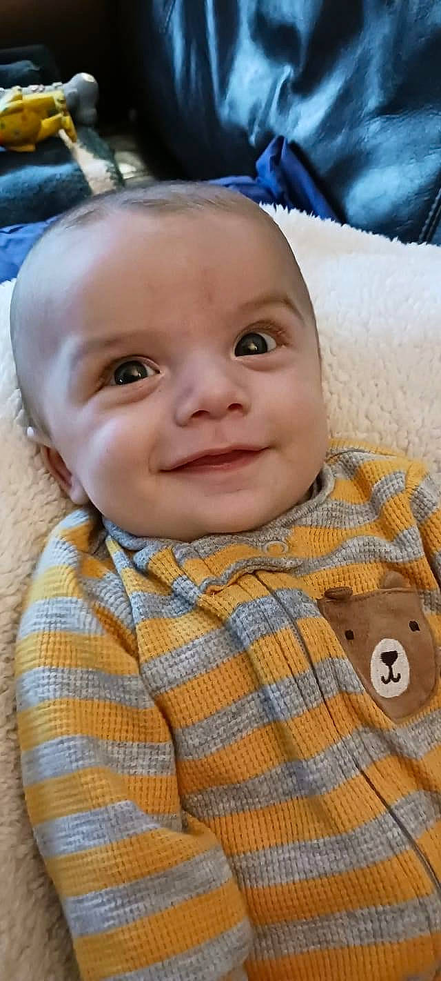 Kaison is registered to the contest to win money with this photo: baby, baby_laughing, baby_toddler_clothing, cheek, child, chin, collar, dress_shirt, eyelash, happy, iris, joy, lip, mammal, nose, pattern, person, plaid, skin, sleeve