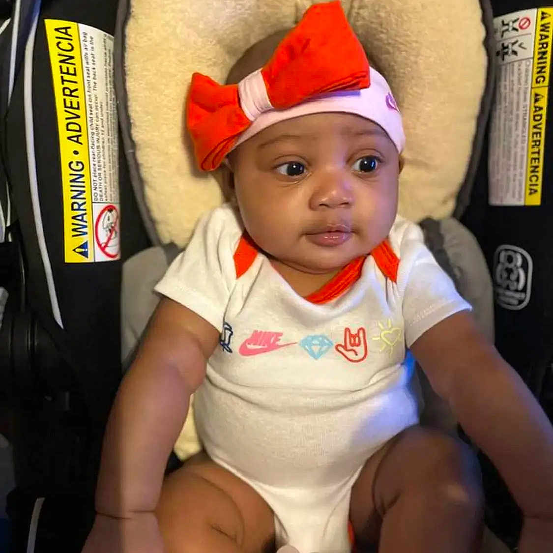 Kelylah joined the competition — help win amazing prizes! baby, babylaughing, cap, clothing, face, happy, hat, head, person, photography, portrait, sitting, sleeve, smile