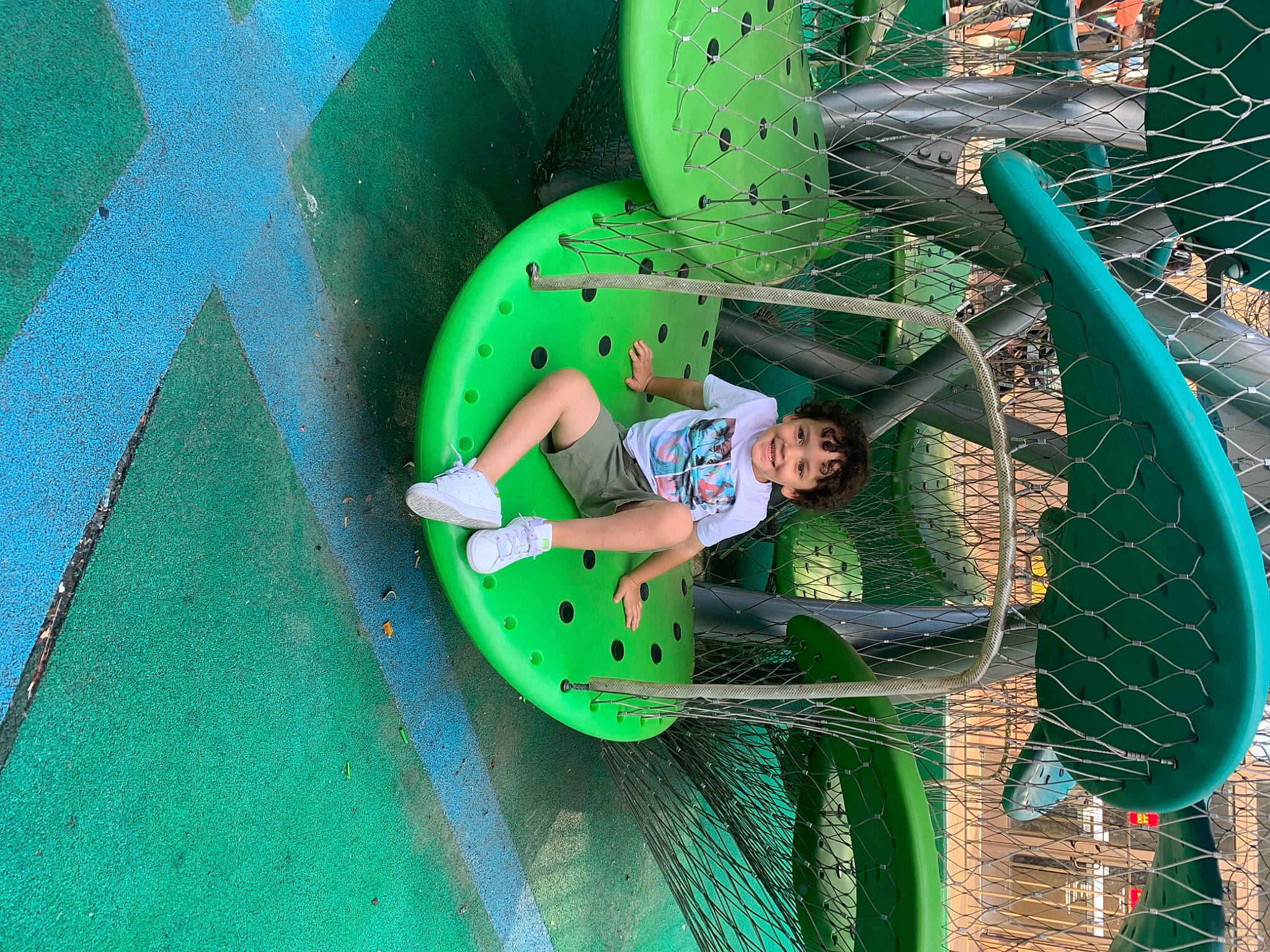 Zyan joined the competition — help win amazing prizes! adventure, amusement_park, amusement_ride, boats_and_boating_equipment_and_supplies, child, chute, circle, city, fun, grass, green, joy, leisure, net, nonbuilding_structure, outdoor_play_equipment, person, play, playground, recreation