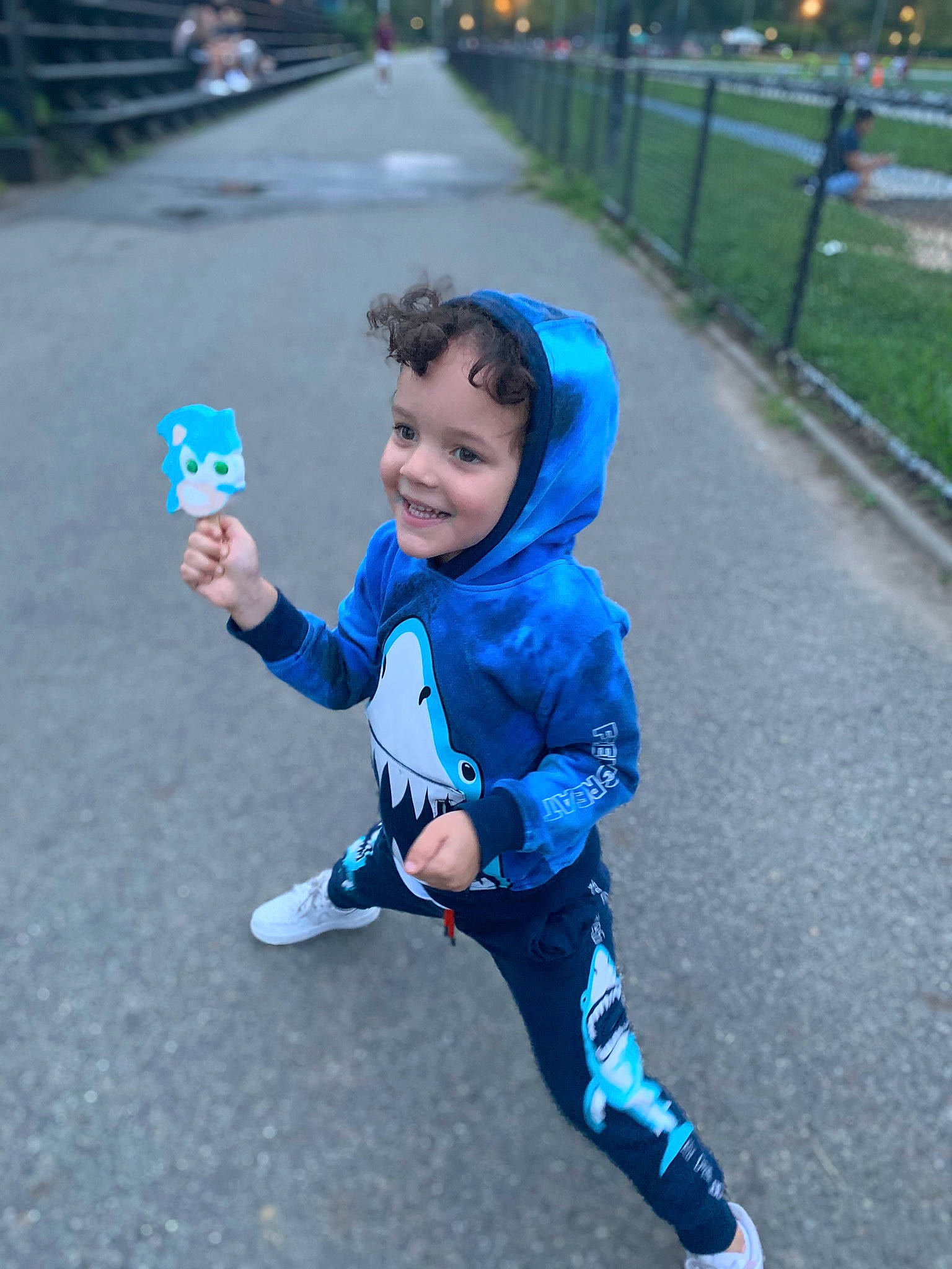 Zyan is registered to the contest to win money with this photo: asphalt, baby_toddler_clothing, child, cool, electric_blue, fun, hand, happy, hat, human_body, joy, leisure, person, personal_protective_equipment, plant, recreation, running, sleeve, smile, sneakers