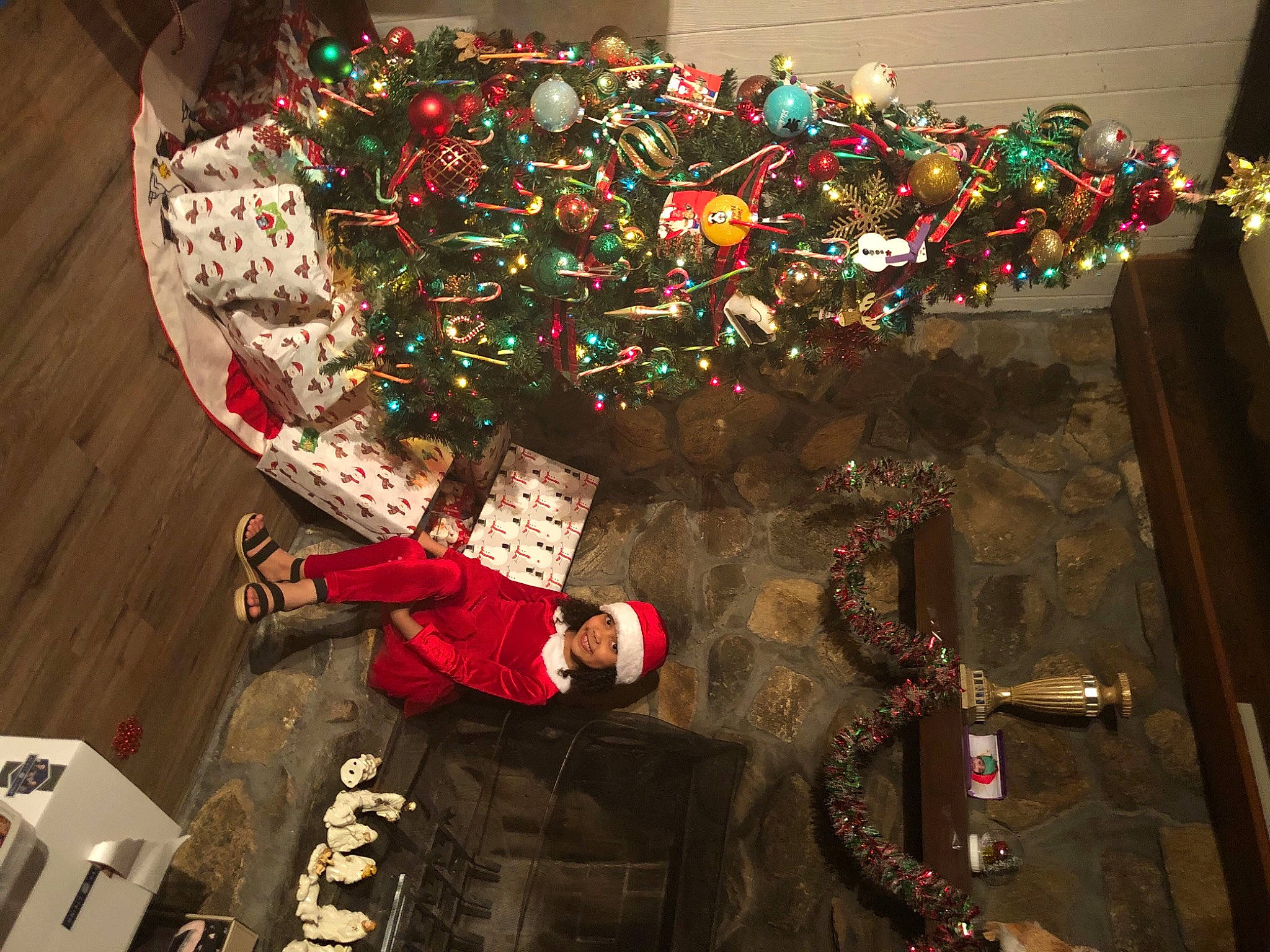 Madelize is registered to the contest to win money with this photo: christmas, christmas_decoration, christmas_eve, christmas_lights, christmas_ornament, christmas_tree, headwear, holiday, holiday_ornament, interior_design, joy, ornament, person, tradition