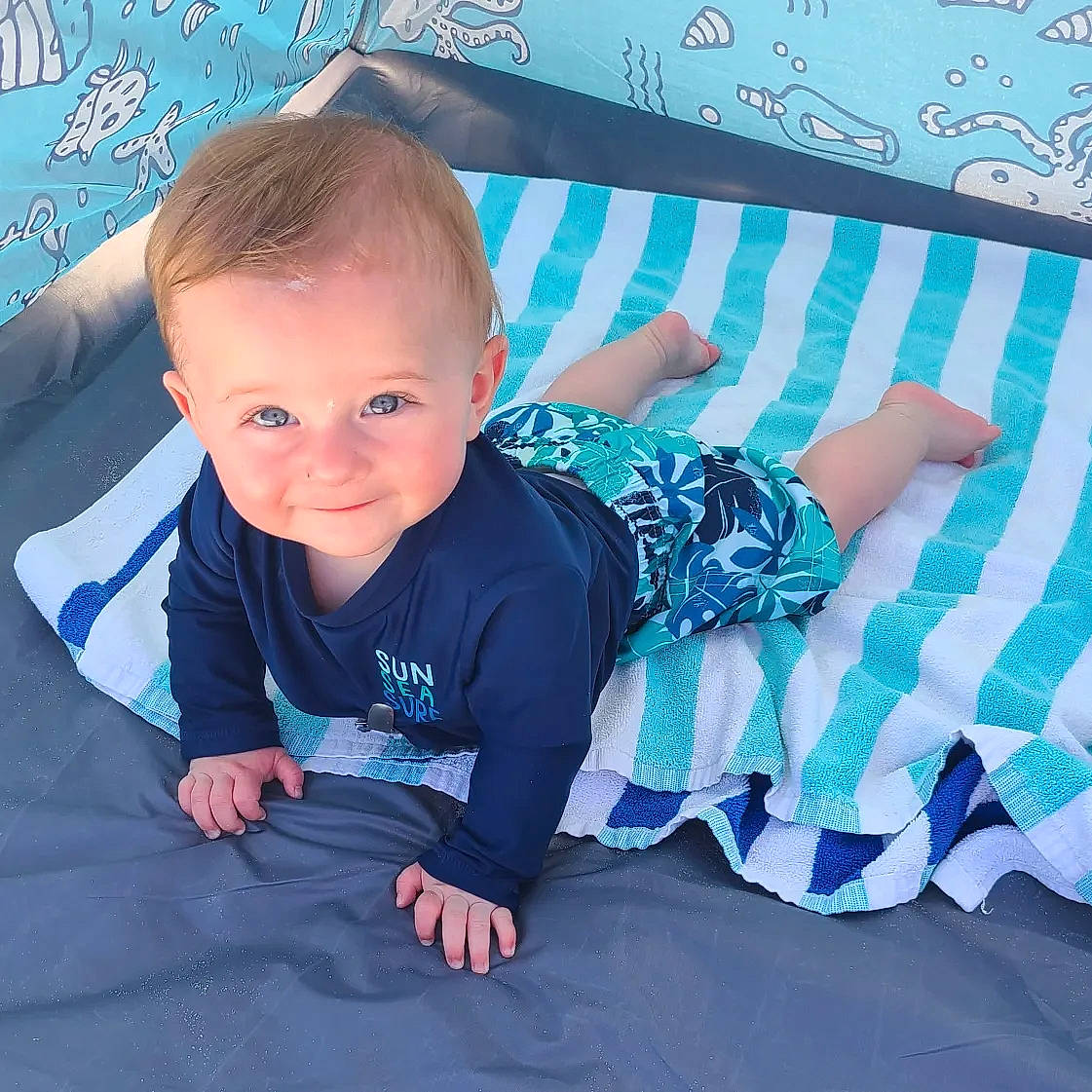 Jett joined the competition — help win amazing prizes! aqua, arm, azure, baby_toddler_clothing, blue, child, comfort, cool, couch, electric_blue, facial_expression, fun, happy, joy, pattern, person, product, sleeve, smile, t_shirt