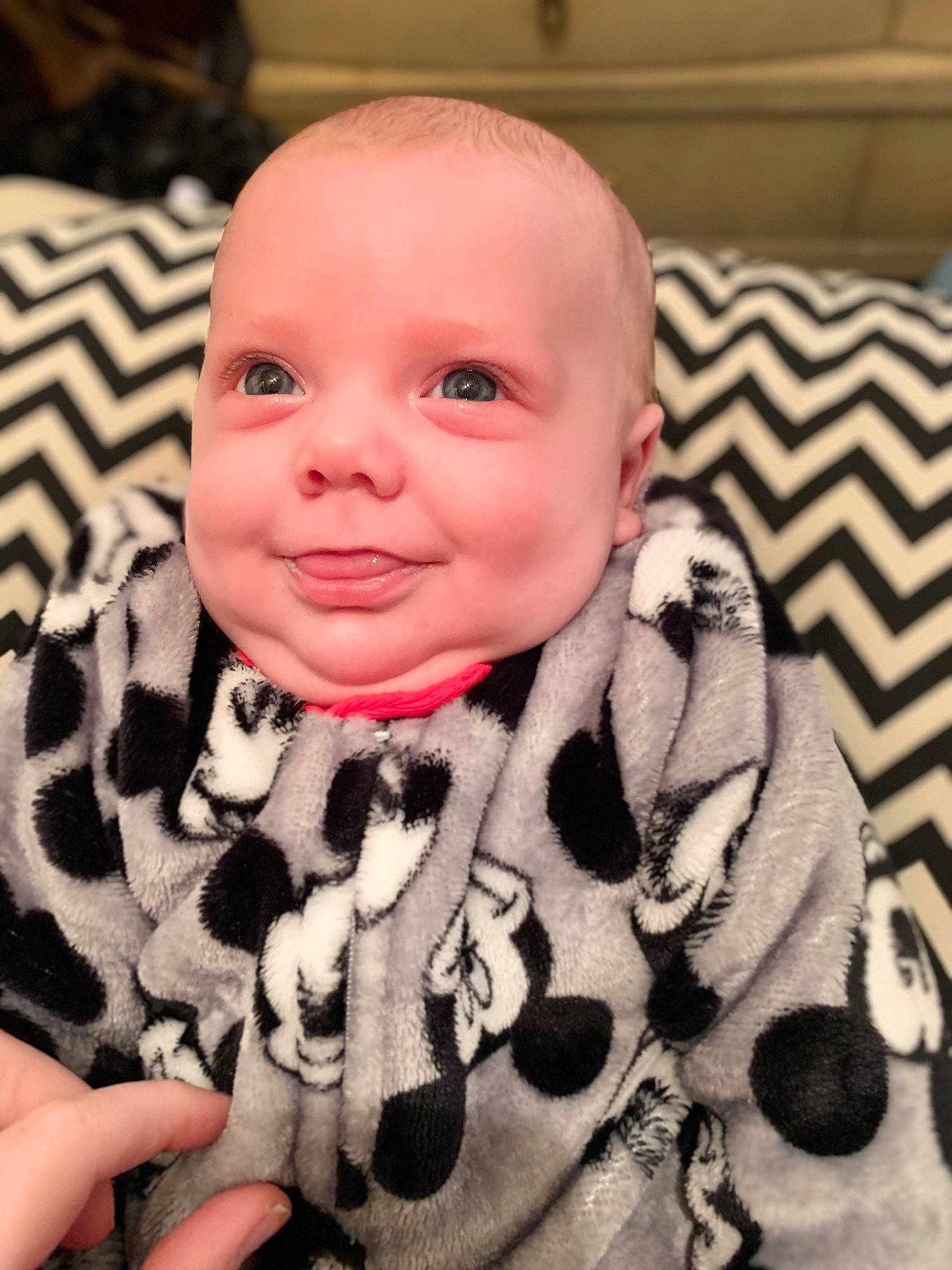 Brentlee is registered to the contest to win money with this photo: baby, baby_toddler_clothing, cheek, chin, comfort, cool, eyebrow, eyelash, face, finger, gesture, iris, joy, nail, outerwear, person, skin, sleeve, smile, textile