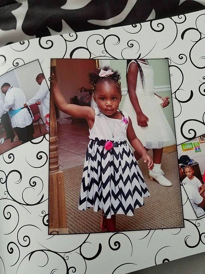 Daija is registered to the contest to win money with this photo: baby_toddler_clothing, child, day_dress, dress, fashion_design, font, formal_wear, happy, magenta, one_piece_garment, pattern, person, pink, rectangle, room, sleeve, style, t_shirt, toddler, visual_arts