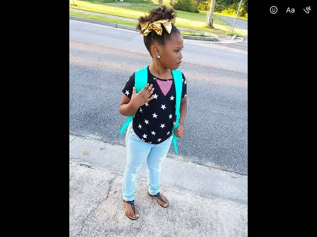 Janiyah Holton joined the competition — help win amazing prizes! asphalt, denim, electric_blue, eyewear, fashion_accessory, flash_photography, happy, headgear, jewellery, magenta, neck, pattern, person, polka_dot, recreation, road, sleeve, sportswear, t_shirt, toddler