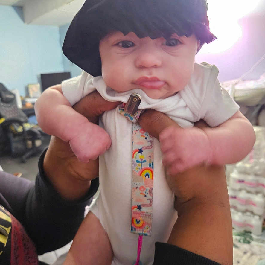 Athena joined the competition — help win amazing prizes! accessories, baby, baseballcap, bodypart, cap, clothing, coat, costume, face, finger, formalwear, hand, hat, head, jacket, necktie, person, photography, portrait, tie