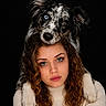 affection, animal, black_background, blue_eyes, closeup, companion, curly_hair, cute, dog, face, friendship, head, heterochromia, merle_coat, pet, photography, portrait, studio, sweater, woman
