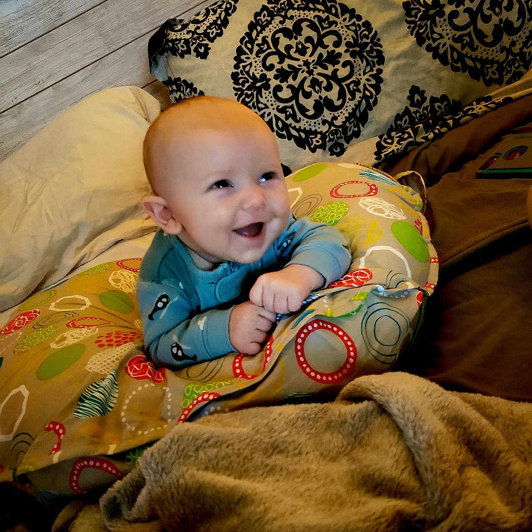 Nikolas is registered to the contest to win money with this photo: baby, child, person, toddler