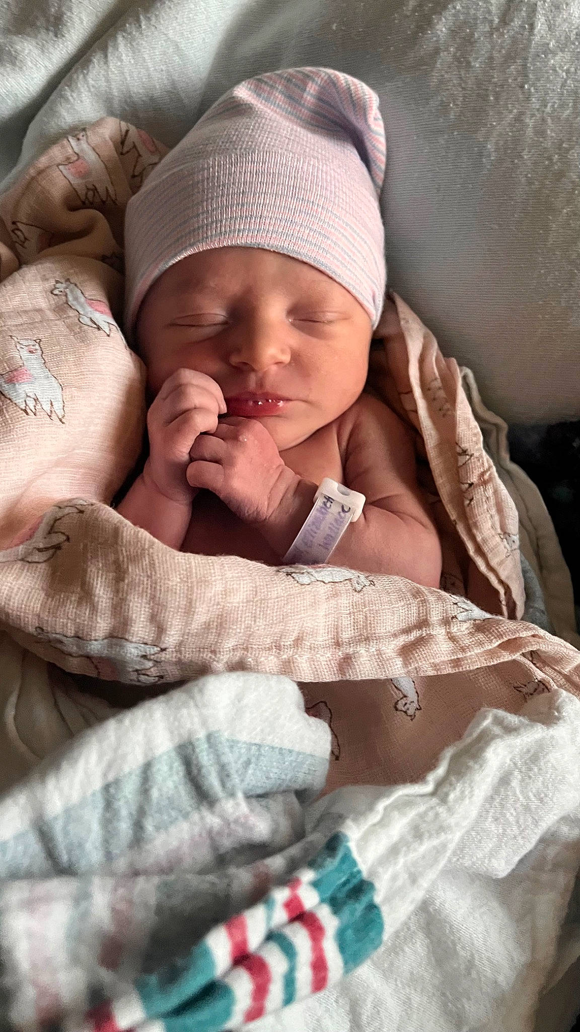 Elizabeth is registered to the contest to win money with this photo: baby, baby_products, baby_safety, baby_sleeping, bedtime, cheek, chest, comfort, eye, eyelash, flesh, gesture, head, headwear, linens, mouth, nail, nose, person, skin