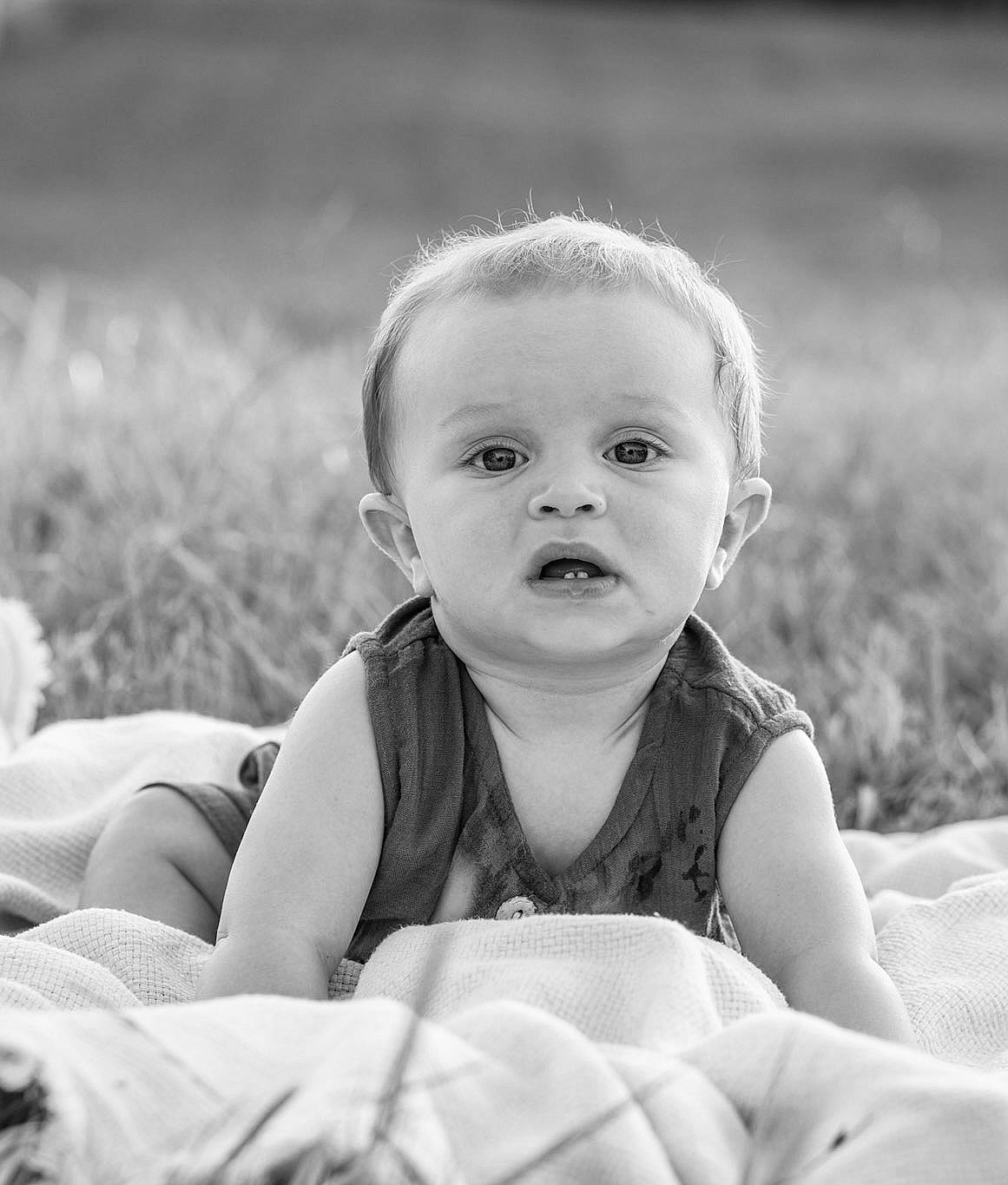 Kace joined the competition — help win amazing prizes! arm, baby, baby_toddler_clothing, black_and_white, cheek, comfort, eye, flash_photography, grass, grey, hand, happy, iris, people_in_nature, person, photograph, skin, standing, style, surprise