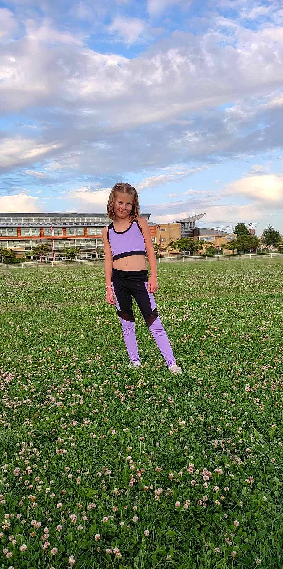 Lana participe au concours pour gagner de l'argent avec cette photo : agriculture, cloud, flash_photography, flower, grass, grass_family, grassland, groundcover, happy, joy, landscape, lawn, leisure, meadow, people_in_nature, person, plain, plant, shorts, sky