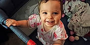 Riley joined the competition — help win amazing prizes! toddler, child, smiling, playpen, balls, blanket, toy, indoors, happy, cute, face, person, clothing, baby, hand, play, young, infant, childhood, expression