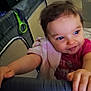 Riley is registered to the contest to win money with this photo: toddler, child, playpen, indoor, baby, smile, hand, face, clothing, toy, hair, furniture, curious, grip, skin, expression, person, room, head, casual