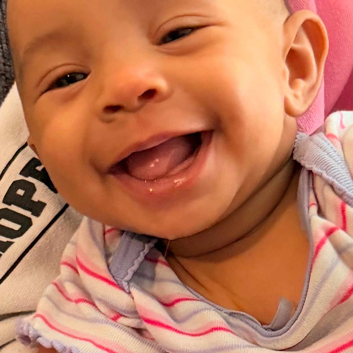 Honestii joined the competition — help win amazing prizes! baby, smiling, face, close_up, infant, child, happy, cute, portrait, clothing, striped, skin, head, eyes, mouth, tongue, ear, cheeks, person, indoors