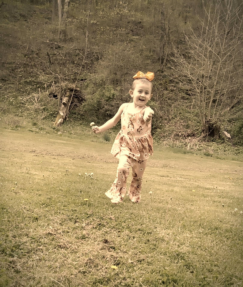 Addley is registered to the contest to win money with this photo: baby, branch, flash_photography, fun, gesture, grass, grassland, happy, joy, landscape, leaf, people_in_nature, person, plant, recreation, shadow, soil, tints_and_shades, toddler, tree