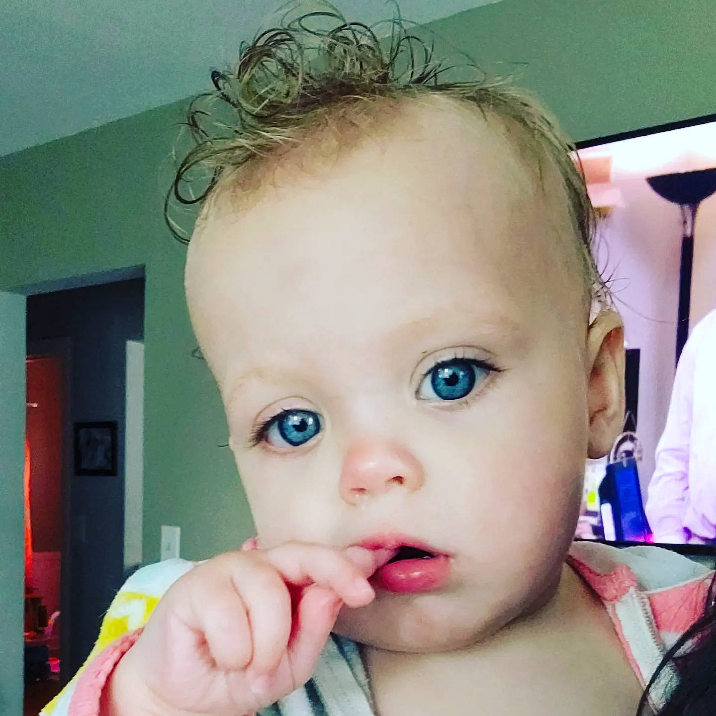 Olivia is registered to the contest to win money with this photo: baby, baby_toddler_clothing, cheek, cool, ear, eye, eyebrow, eyelash, finger, gesture, happy, iris, jaw, lip, mouth, neck, nose, person, skin, thumb