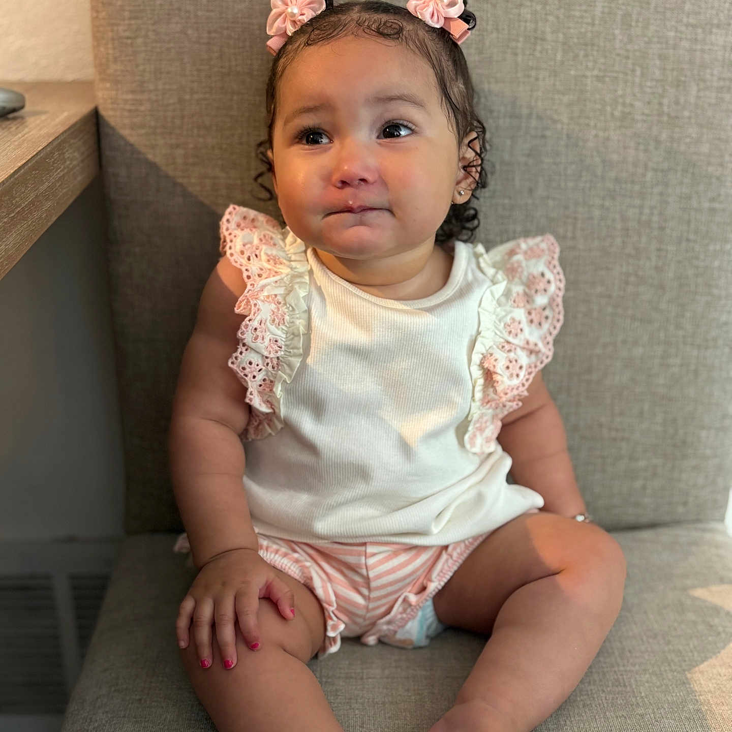 Kyliya Fields joined the competition — help win amazing prizes! baby, chair, child, clothing, curly_hair, cute, expression, face, foot, frilly, girl, hair_accessories, hand, indoor, nail_polish, pink, portrait, sitting, skin, toddler