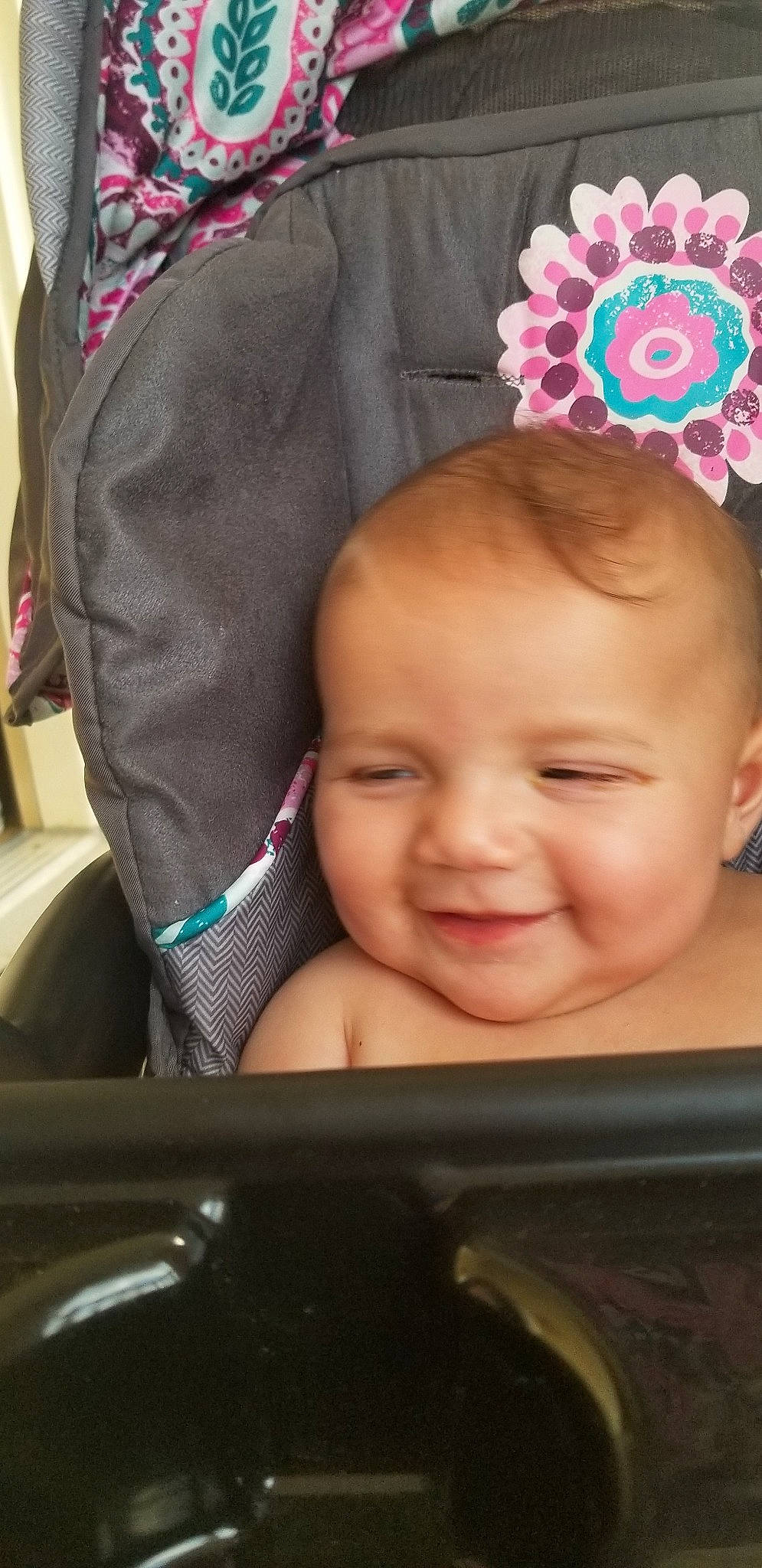 Cierra is registered to the contest to win money with this photo: baby, baby_carriage, baby_products, cheek, child, ear, face, forehead, hair_accessory, head, headgear, joy, person, pink, product, skin, smile, toddler