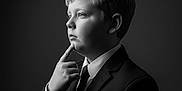 Nicholas joined the competition — help win amazing prizes! background, black_and_white, boy, child, clothing, expression, face, formal, hair, lighting, monochrome, portrait, pose, profile, serious, studio, suit, thinking, tie, young