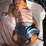 Raelynn joined the competition — help win amazing prizes! baby, newborn, sleeping, pacifier, pink_shirt, blue_shorts, blanket, soft_texture, indoors, cozy, cute, child, infant, resting, warm_light, peaceful, small_clothes, white_socks, portrait, toddler