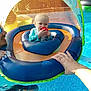 Remington joined the competition — help win amazing prizes! baby, child, pool, water, inflatable, float, toy, adult, hand, sunlight, canopy, summer, outdoor, swimming, blue, safety, recreation, fun, parent, daytime