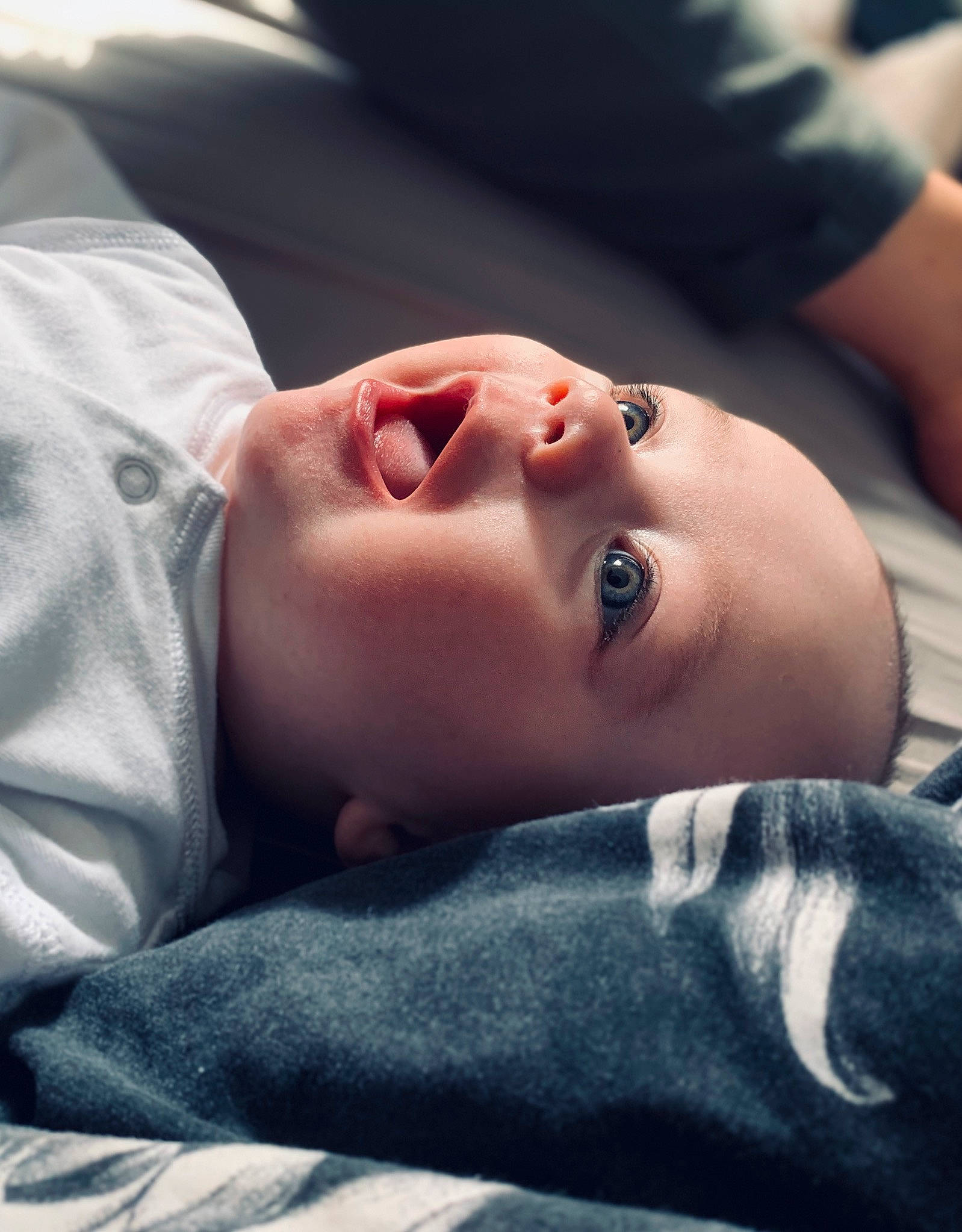 Noah James is registered to the contest to win money with this photo: arm, baby, cheek, child, chin, ear, eye, face, hand, head, joint, lip, mouth, muscle, nap, neck, nose, person, skin, sleep