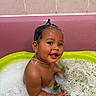 Leeroy participe au concours pour gagner de l'argent avec cette photo : baby, child, bath, bathtub, foam, bubbles, water, showerhead, smile, happy, wet, skin, hair, indoors, pink, green, soap, play, cute, portrait