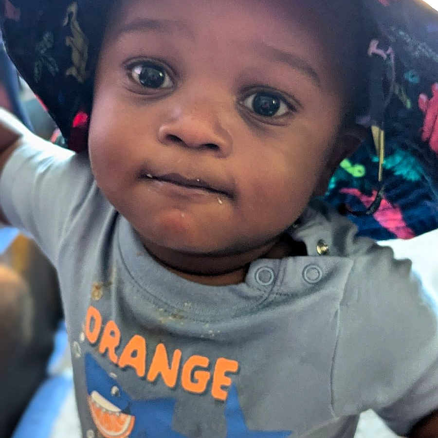 Josiah joined the competition — help win amazing prizes! baby, baseballcap, bodypart, cap, clothing, coat, face, happy, hat, head, jacket, mouth, pants, person, photography, portrait, selfie, smile, sunhat, t_shirt
