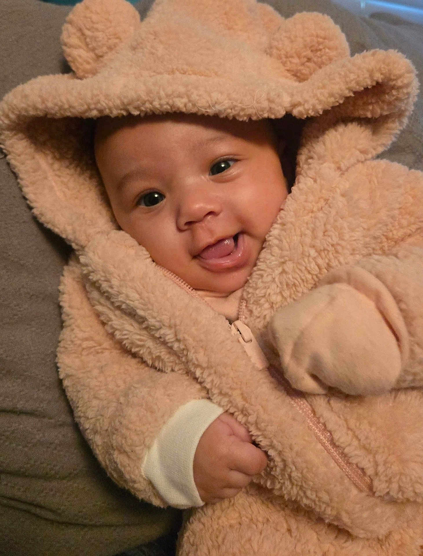 J Myah Amiri is registered to the contest to win money with this photo: baby, blanket, bonnet, clothing, face, happy, hat, head, hood, hoodie, knitwear, newborn, person, photography, portrait, quilt, smile, sweater, sweatshirt, towel