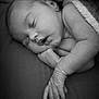 Rose participe au concours pour gagner de l'argent avec cette photo : baby, bed, black_and_white, blanket, child, closeup, cozy, cute, face, hand, infant, newborn, peaceful, portrait, quiet, relaxed, rest, skin, sleeping, soft