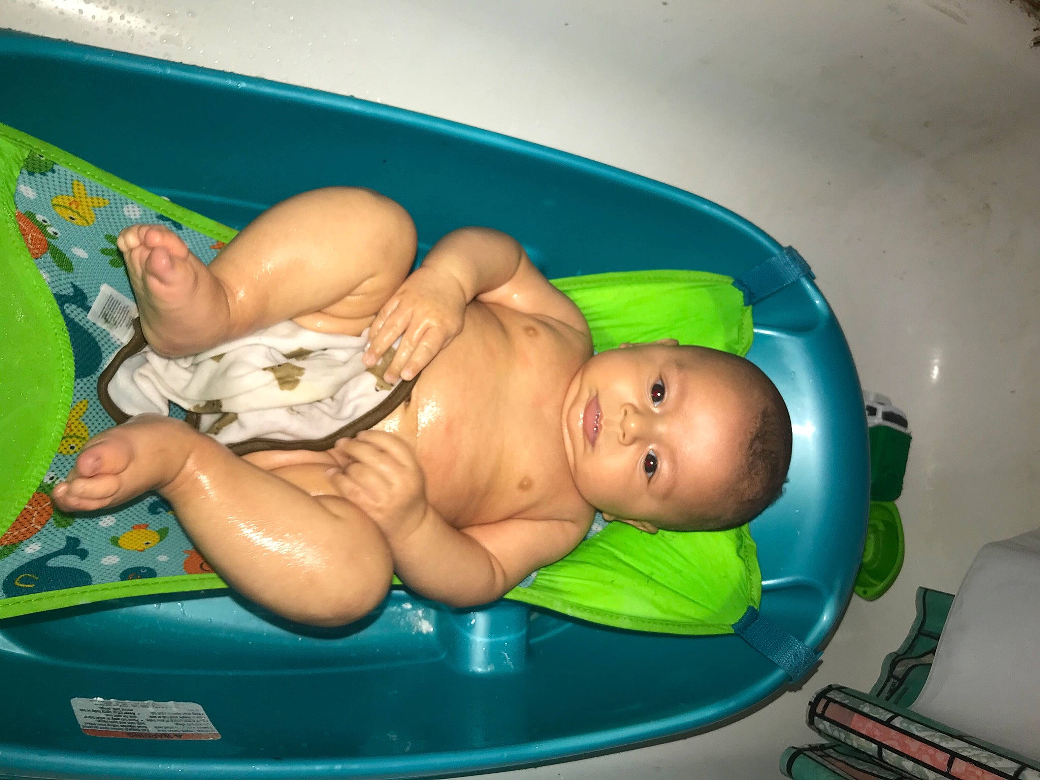Blayne is registered to the contest to win money with this photo: abdomen, baby, baby_bathing, baby_products, baby_toys, barechested, bathing, bathtub, chest, child, comfort, fun, inflatable, leisure, person, plastic, recreation, skin, thigh, toddler