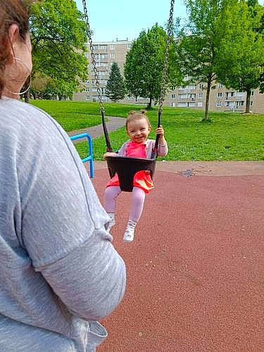 Brianna participe au concours pour gagner de l'argent avec cette photo : asphalt, athlete, city, fun, gesture, grass, joy, lap, leisure, outdoor_recreation, person, plant, recreation, running, shorts, sky, summer, swing, t_shirt, thigh