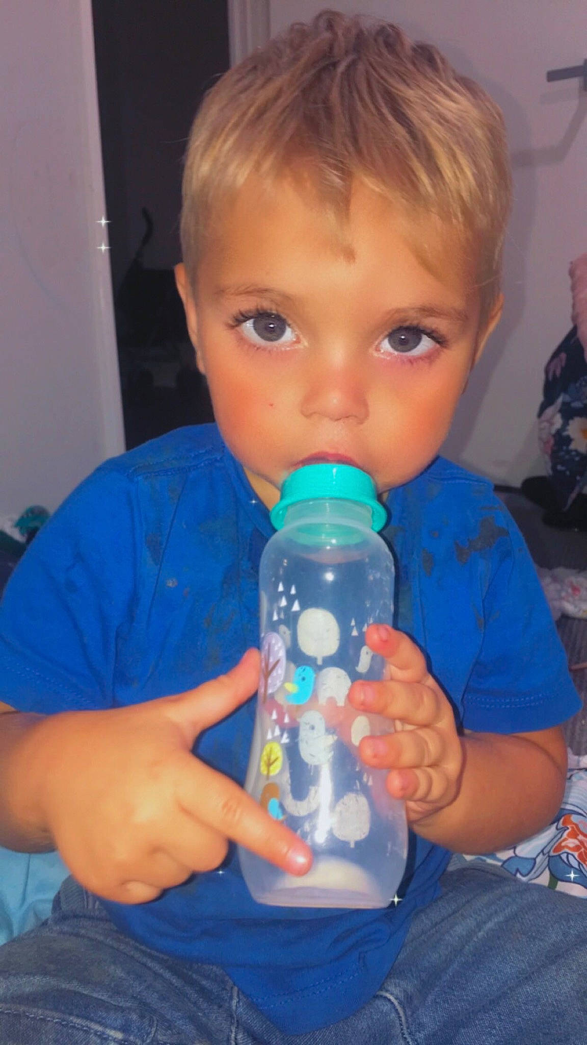 Cassius joined the competition — help win amazing prizes! baby_bottle, baby_products, bottle, bottled_water, drink, drinking, drinking_water, drinkware, electric_blue, finger, fluid, gas, liquid, mineral_water, nail, person, plastic, plastic_bottle, toddler, water